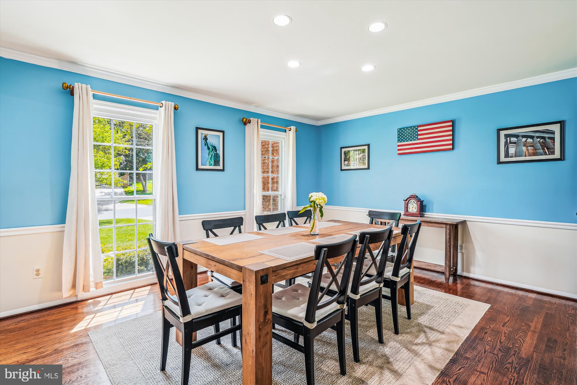 9117 Paddock Lane Potomac, MD 20854 - Photo 15 of 69 a view of a dining room with furniture and wooden floor