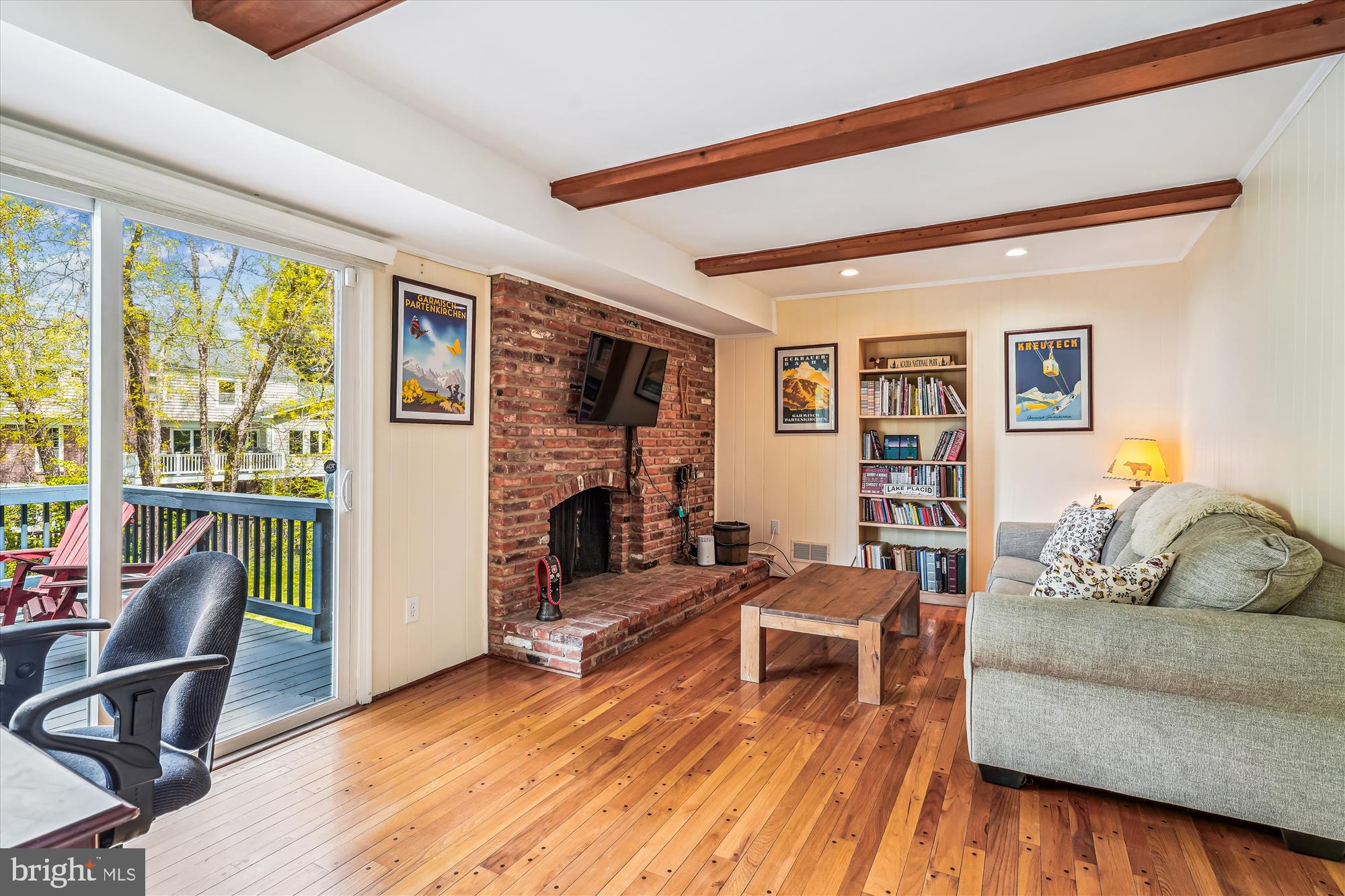 9117 Paddock Lane Potomac, MD 20854 - Photo 23 of 69 a living room with furniture and a wooden floor