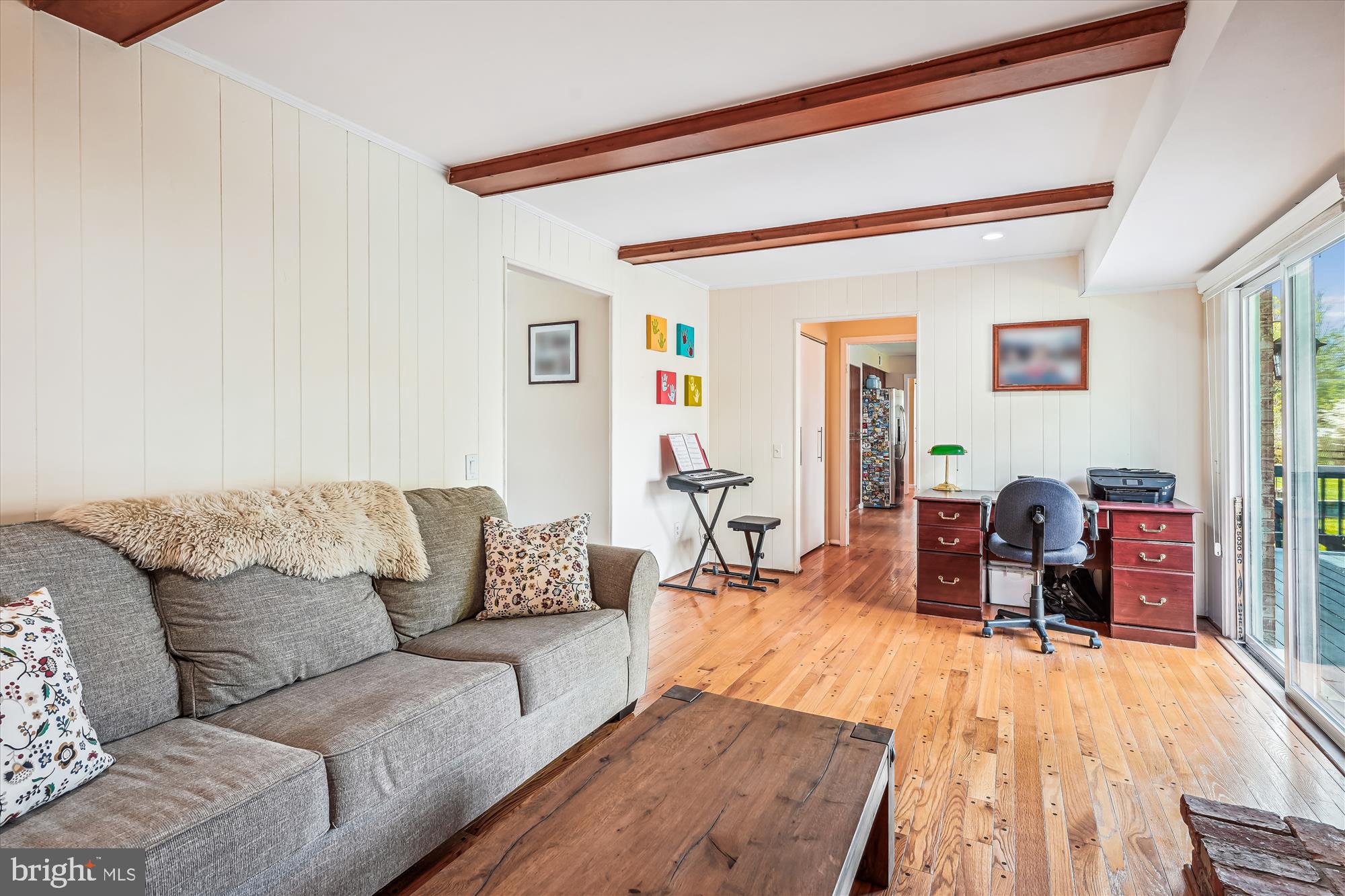 9117 Paddock Lane Potomac, MD 20854 - Photo 24 of 69 a living room with furniture and a wooden floor
