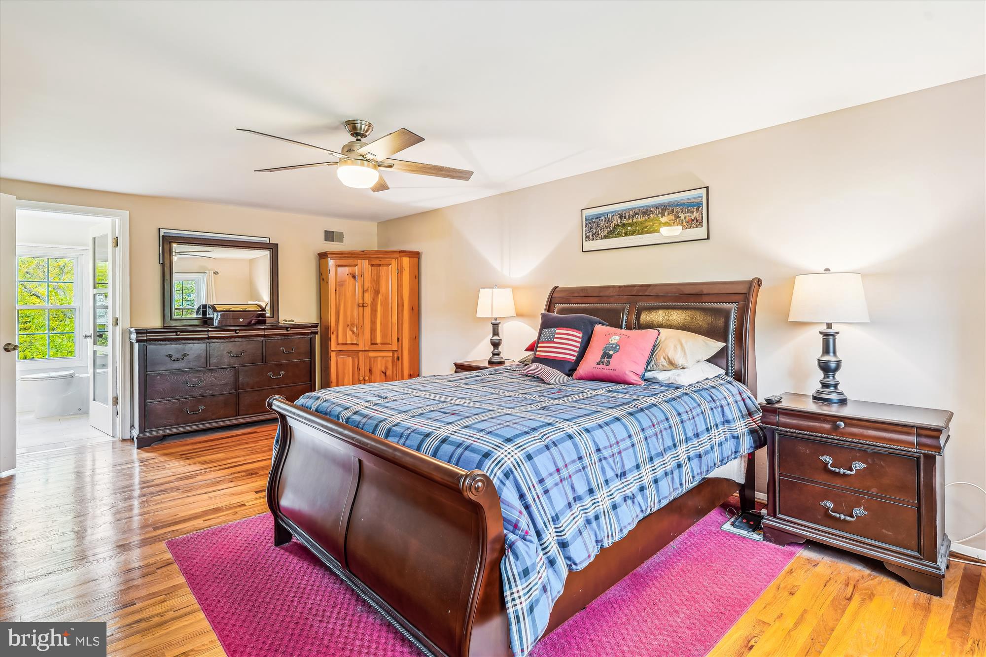 9117 Paddock Lane Potomac, MD 20854 - Photo 33 of 69 a bedroom with a bed and a dresser