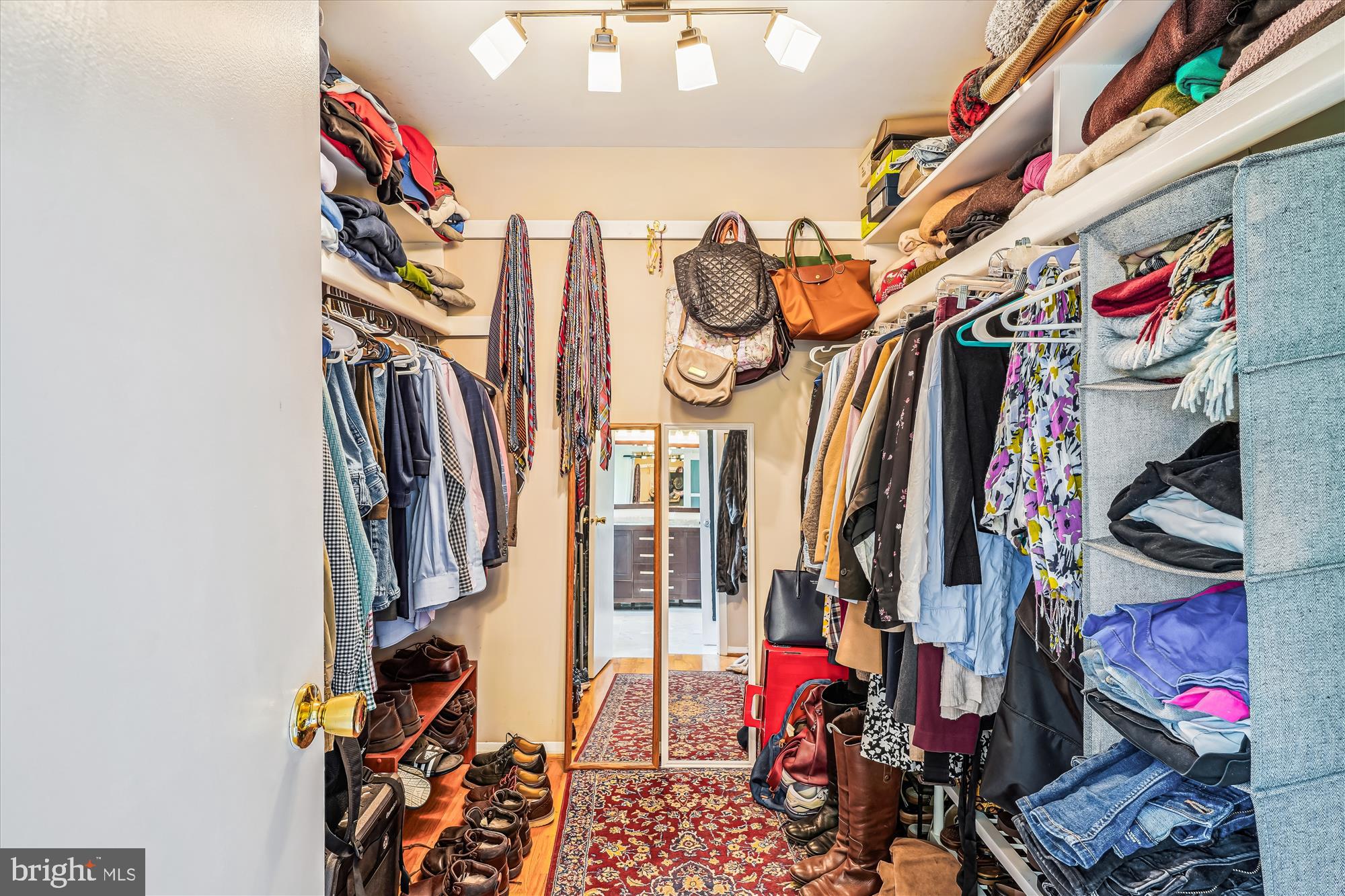 9117 Paddock Lane Potomac, MD 20854 - Photo 39 of 69 a view of walk in closet with clothes