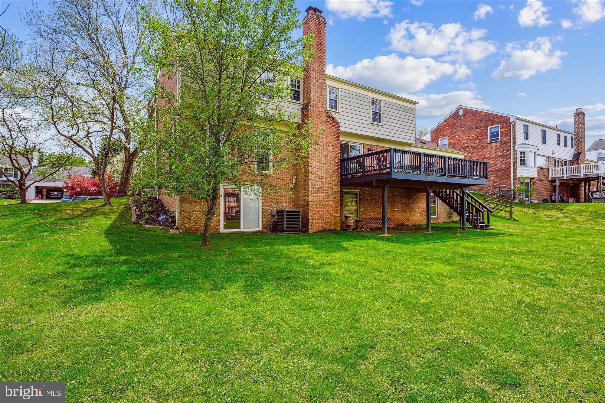 9117 Paddock Lane Potomac, MD 20854 - Photo 4 of 69 a view of a house with a backyard