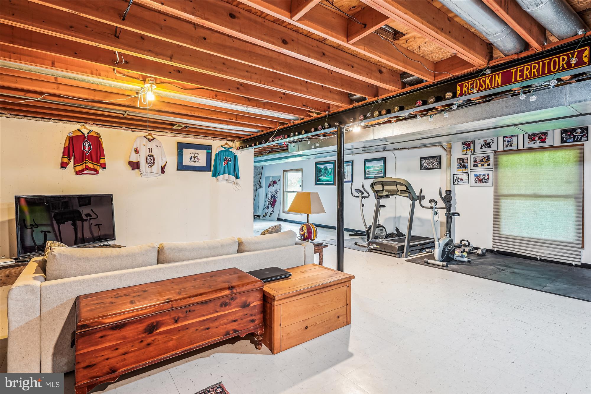 9117 Paddock Lane Potomac, MD 20854 - Photo 51 of 69 a room with gym equipment and a table