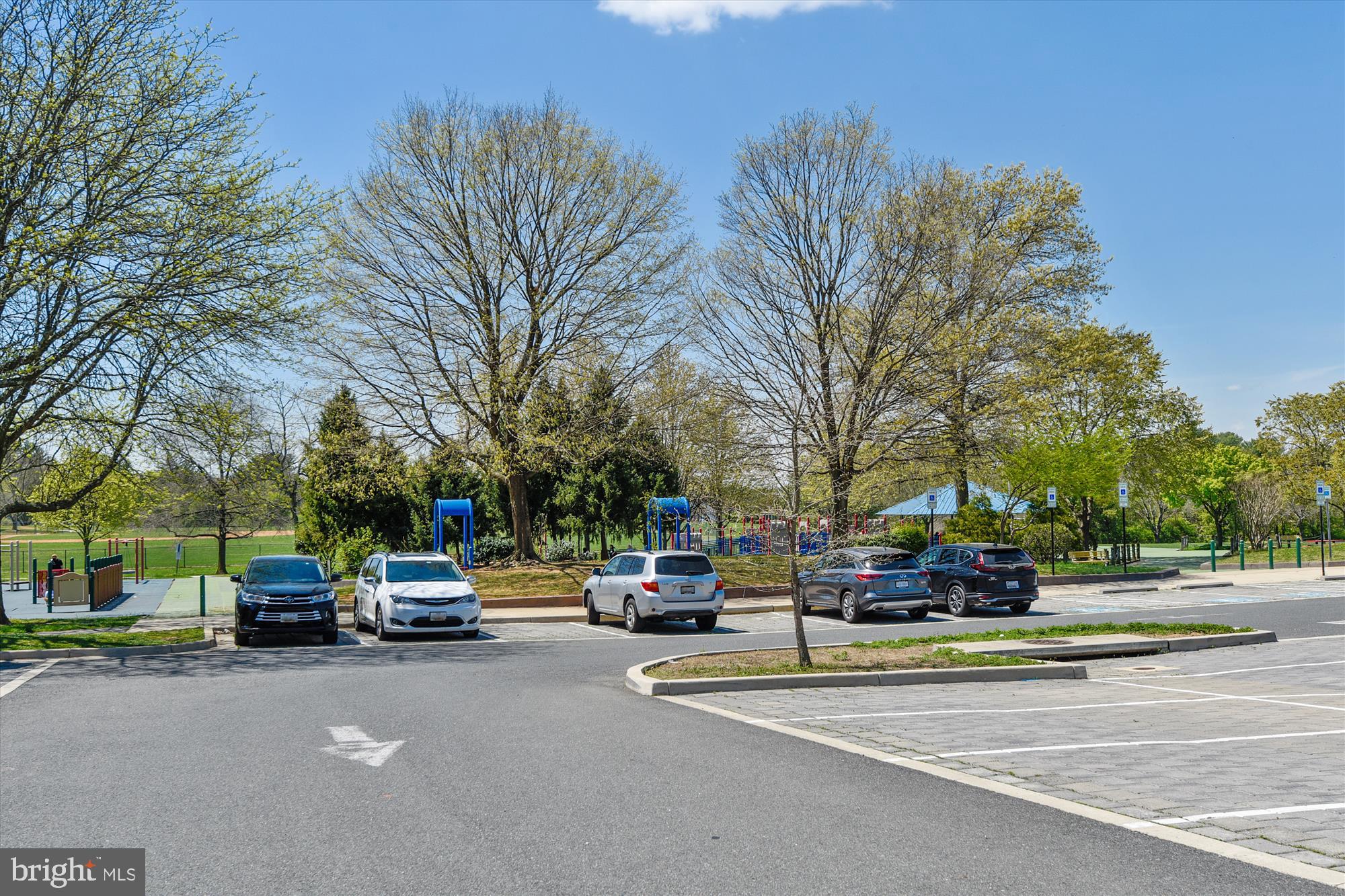 9117 Paddock Lane Potomac, MD 20854 - Photo 63 of 69 a view of road with parked cars