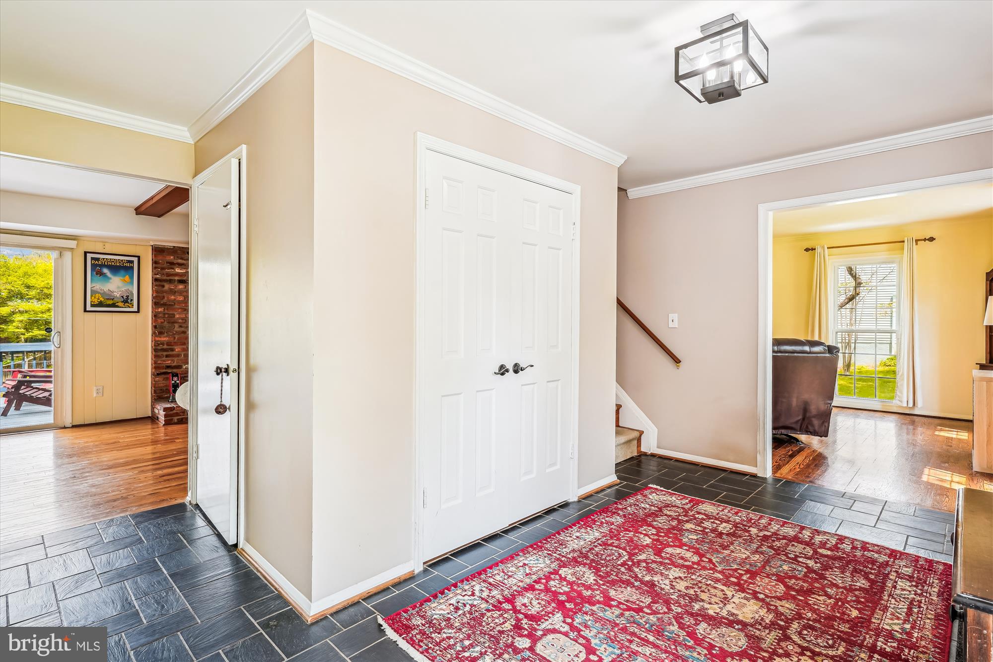 9117 Paddock Lane Potomac, MD 20854 - Photo 9 of 69 a view of a hallway view with wooden floor and windows