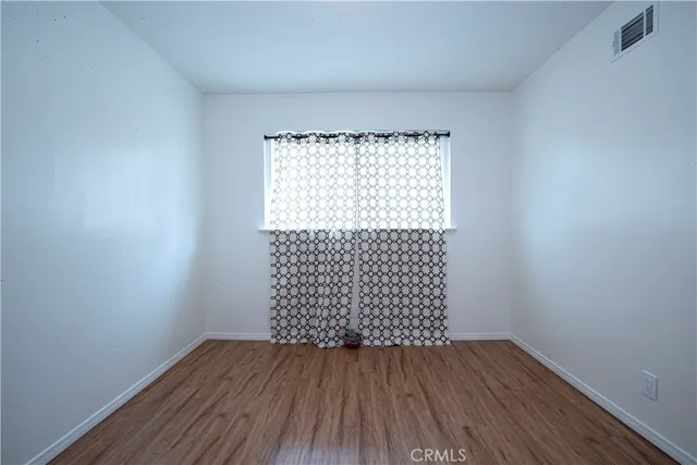 a bathroom with a toilet a sink and shower