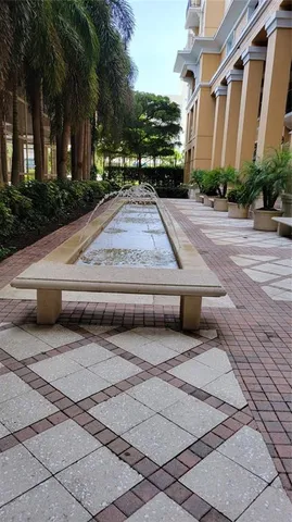 a view of yard with large trees