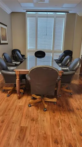 a view of a workspace with furniture