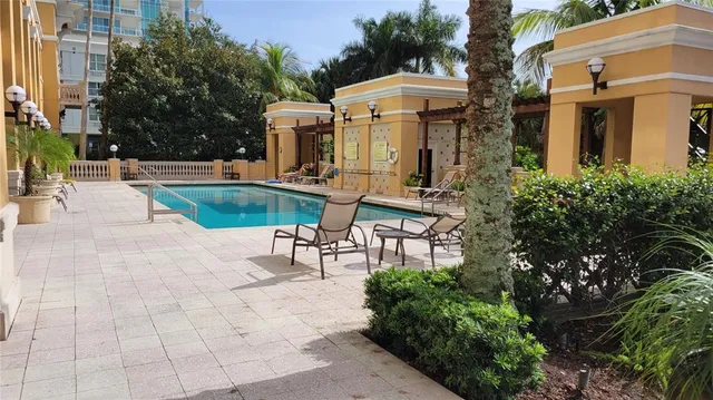 a view of a building with sitting area