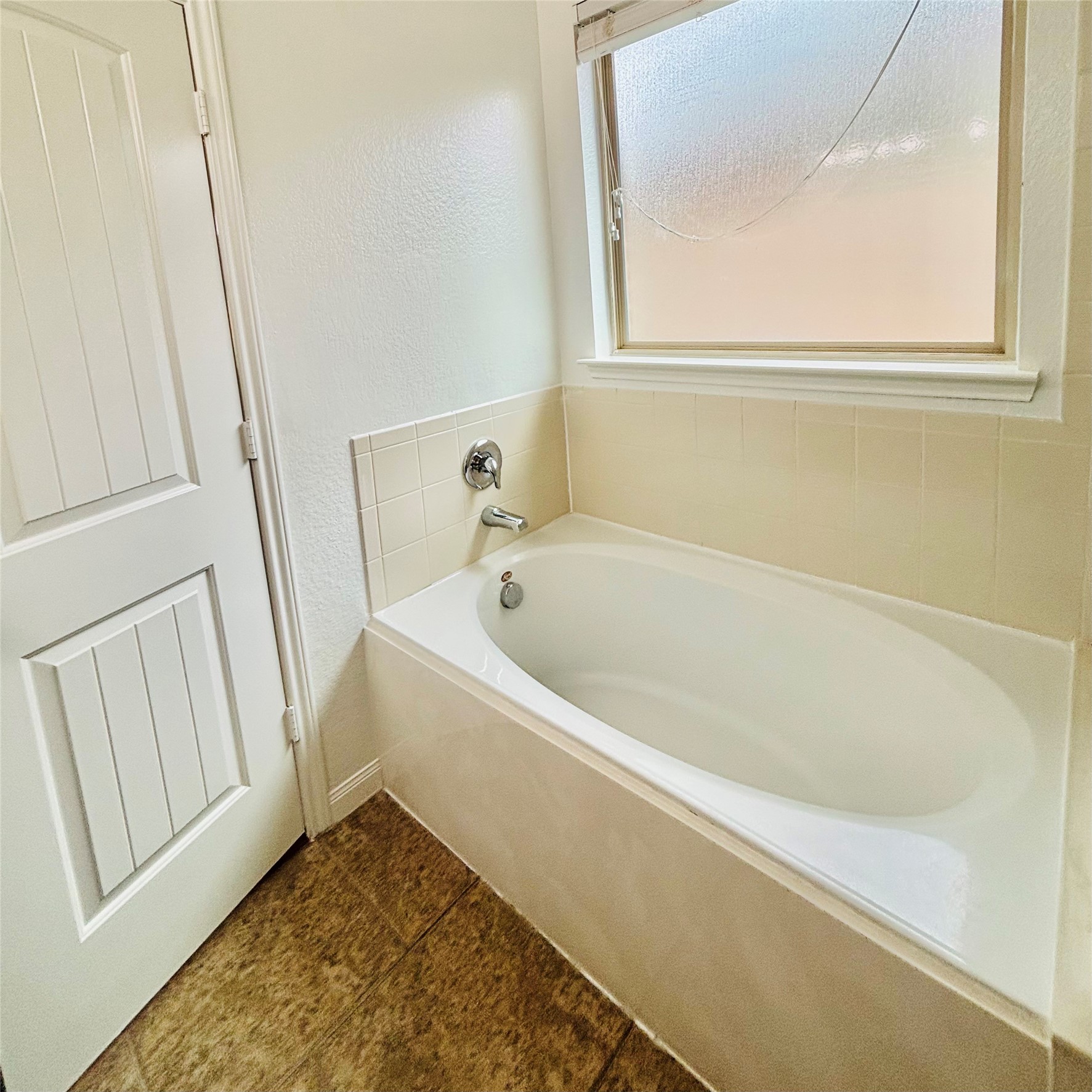 22480 Toronado Ridge Lane Porter, TX 77365 - Photo 31 of 42 a white bath tub sitting next to a window