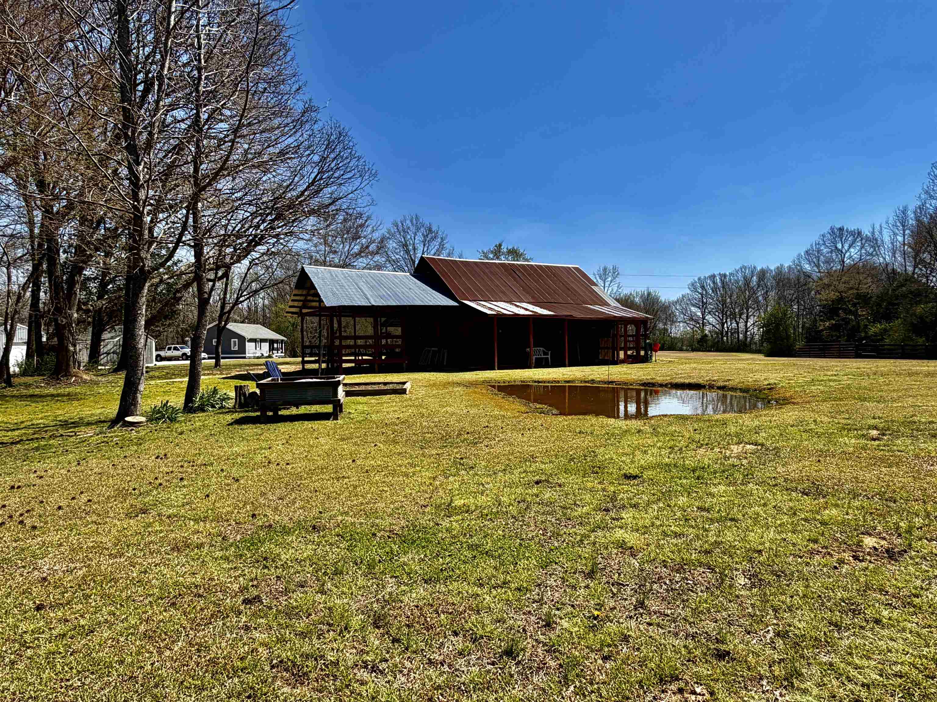 6195 Bobbitt Road Moscow, TN 38057 - Photo 17 of 40 a swimming pool view with a outdoor seating