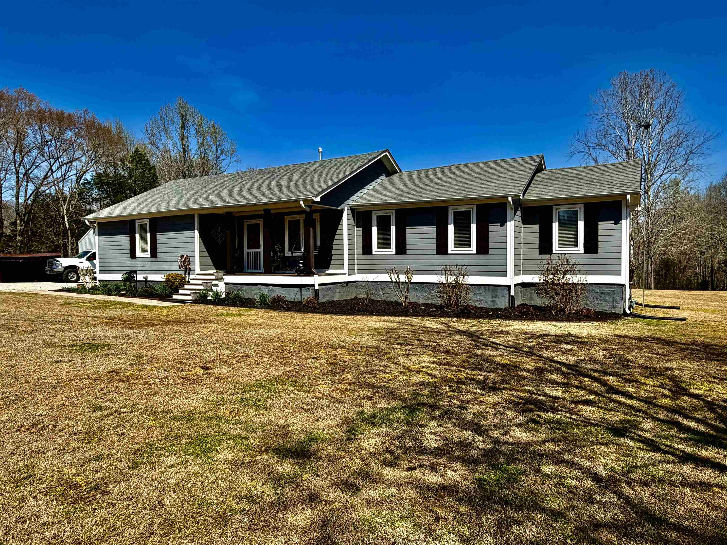 6195 Bobbitt Road Moscow, TN 38057 - Photo 2 of 40 a front view of a house with a yard