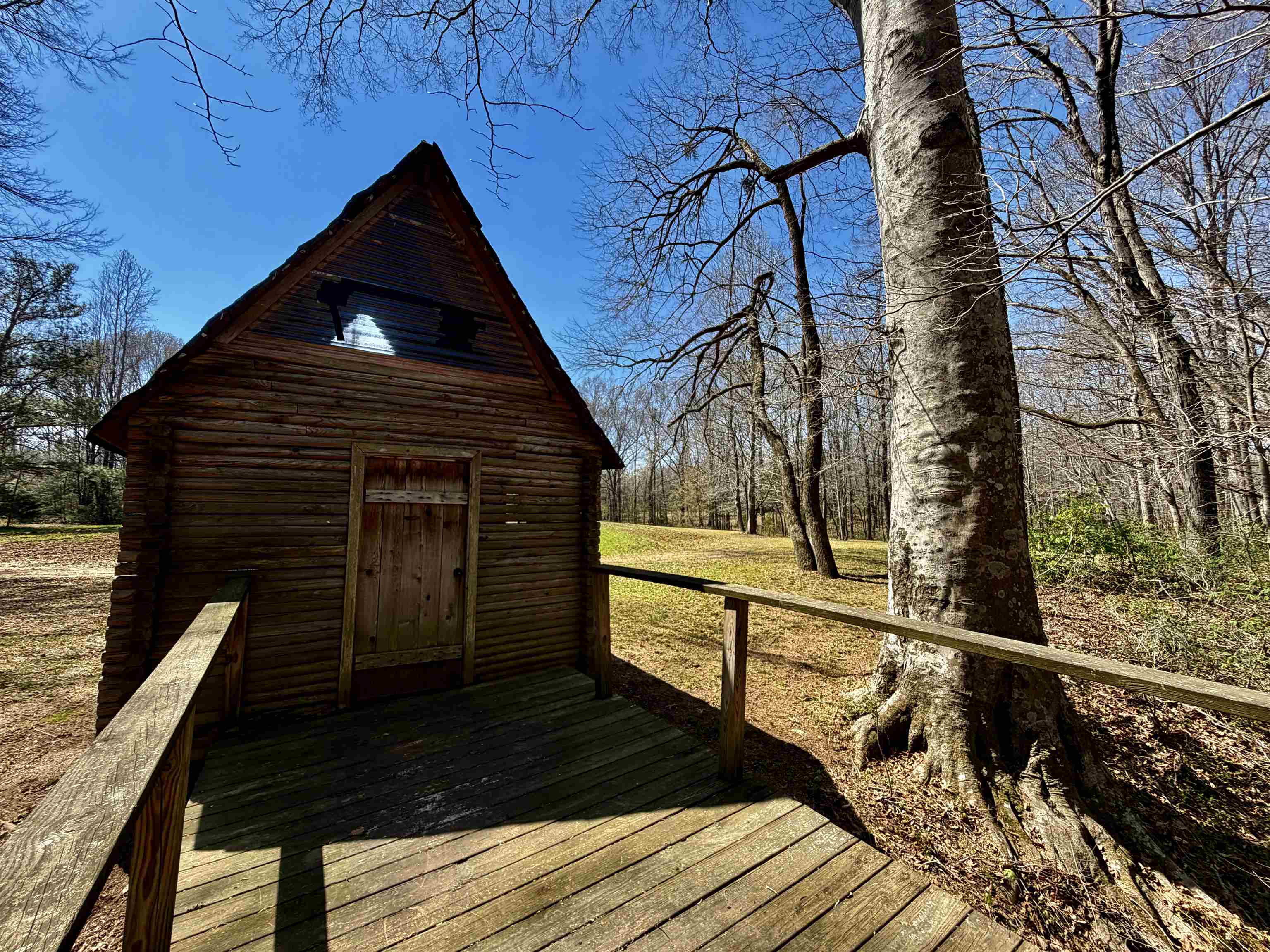 6195 Bobbitt Road Moscow, TN 38057 - Photo 25 of 40 a view of balcony with wooden floor and fence and a bench
