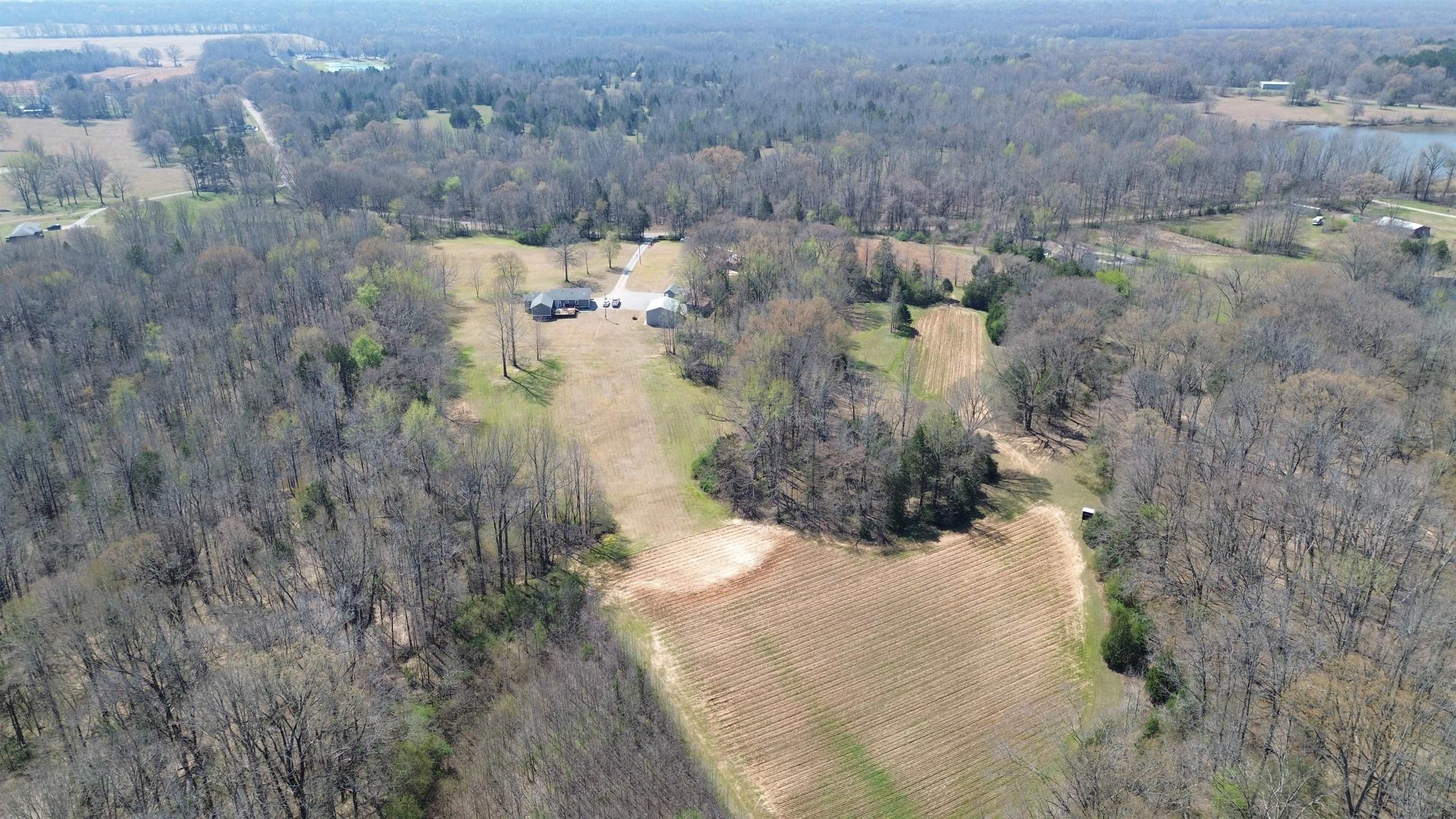 6195 Bobbitt Road Moscow, TN 38057 - Photo 32 of 40 a view of a lake with a mountain