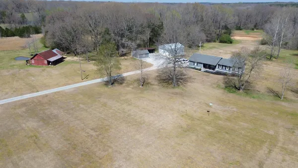a view of a backyard of a house