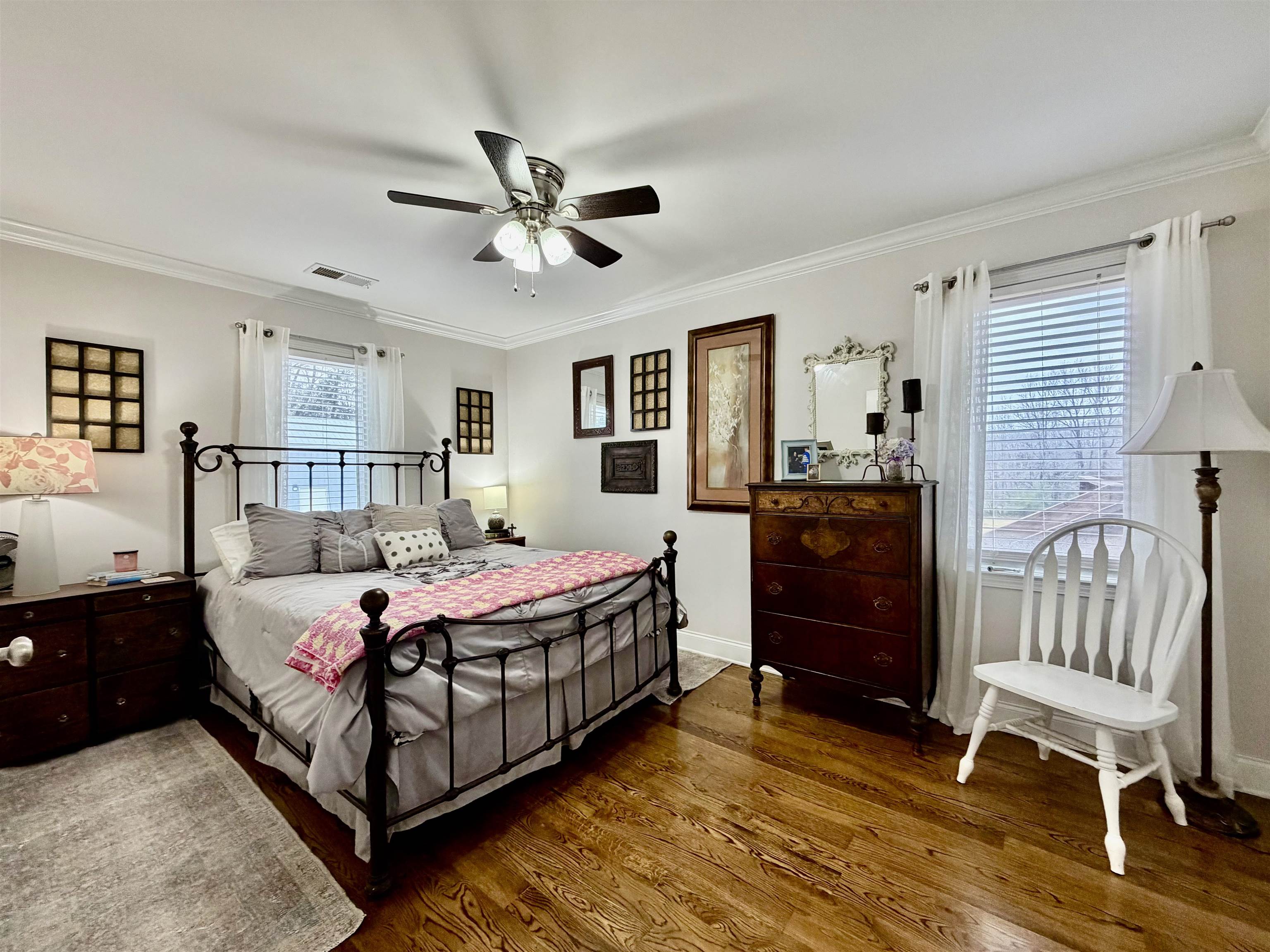 6195 Bobbitt Road Moscow, TN 38057 - Photo 7 of 40 a bedroom with a bed and a dresser in it