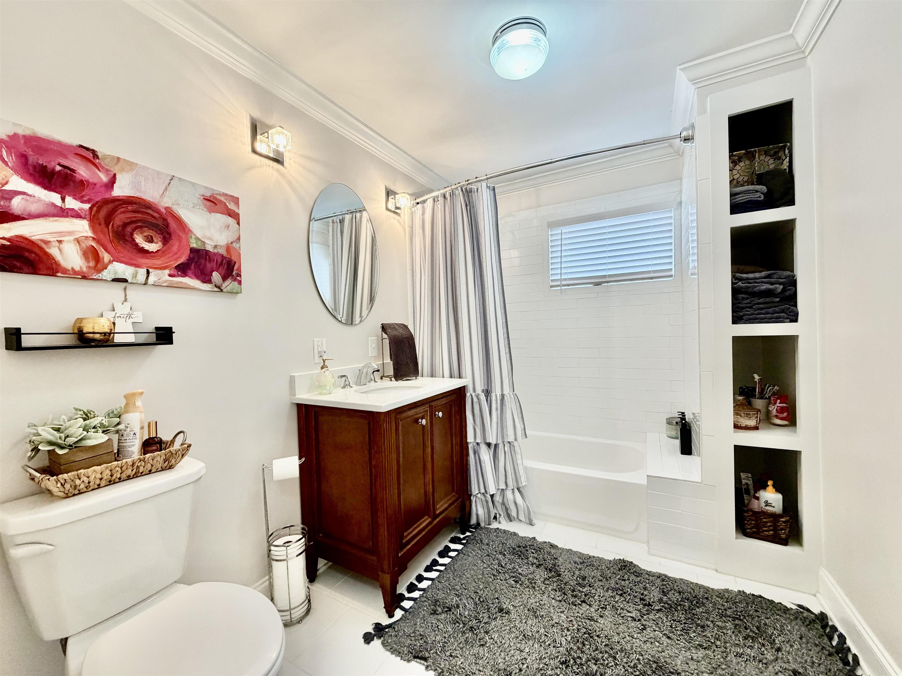 6195 Bobbitt Road Moscow, TN 38057 - Photo 8 of 40 a bathroom with a sink toilet and shower