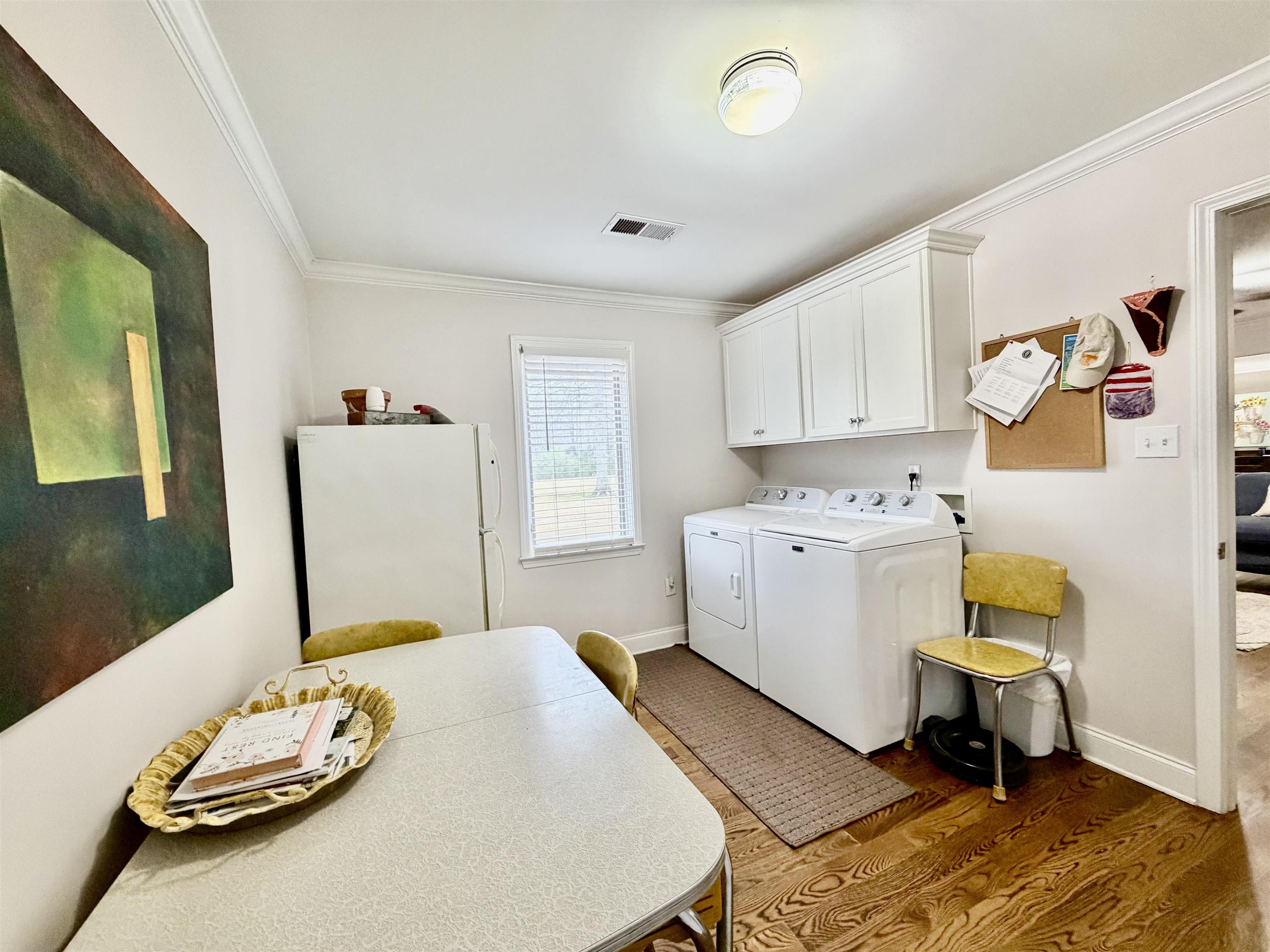 6195 Bobbitt Road Moscow, TN 38057 - Photo 10 of 40 a bedroom with a bed and a chair