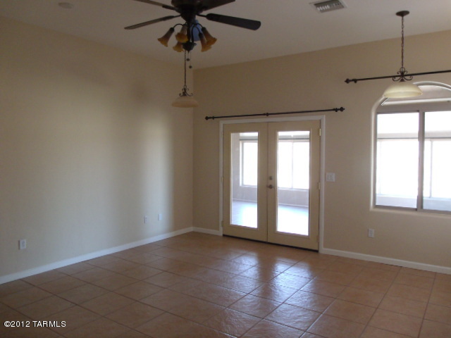 1490 Circulo Jacona Rio Rico, AZ 85648 - Photo 14 of 29 a view of an empty room with a window