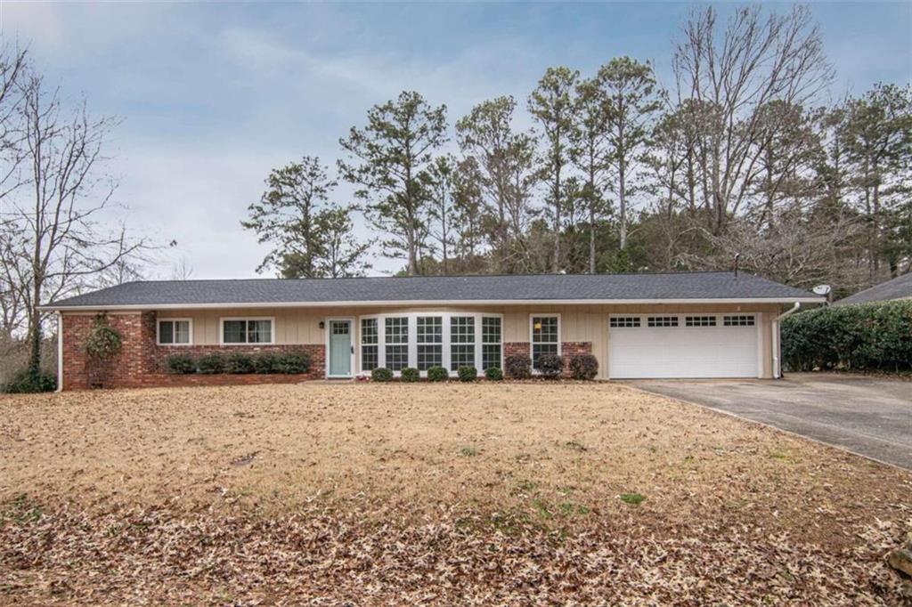 8 Mitchell Circle Southeast Rome, GA 30161 - Photo 1 of 1 front view of a house with a yard