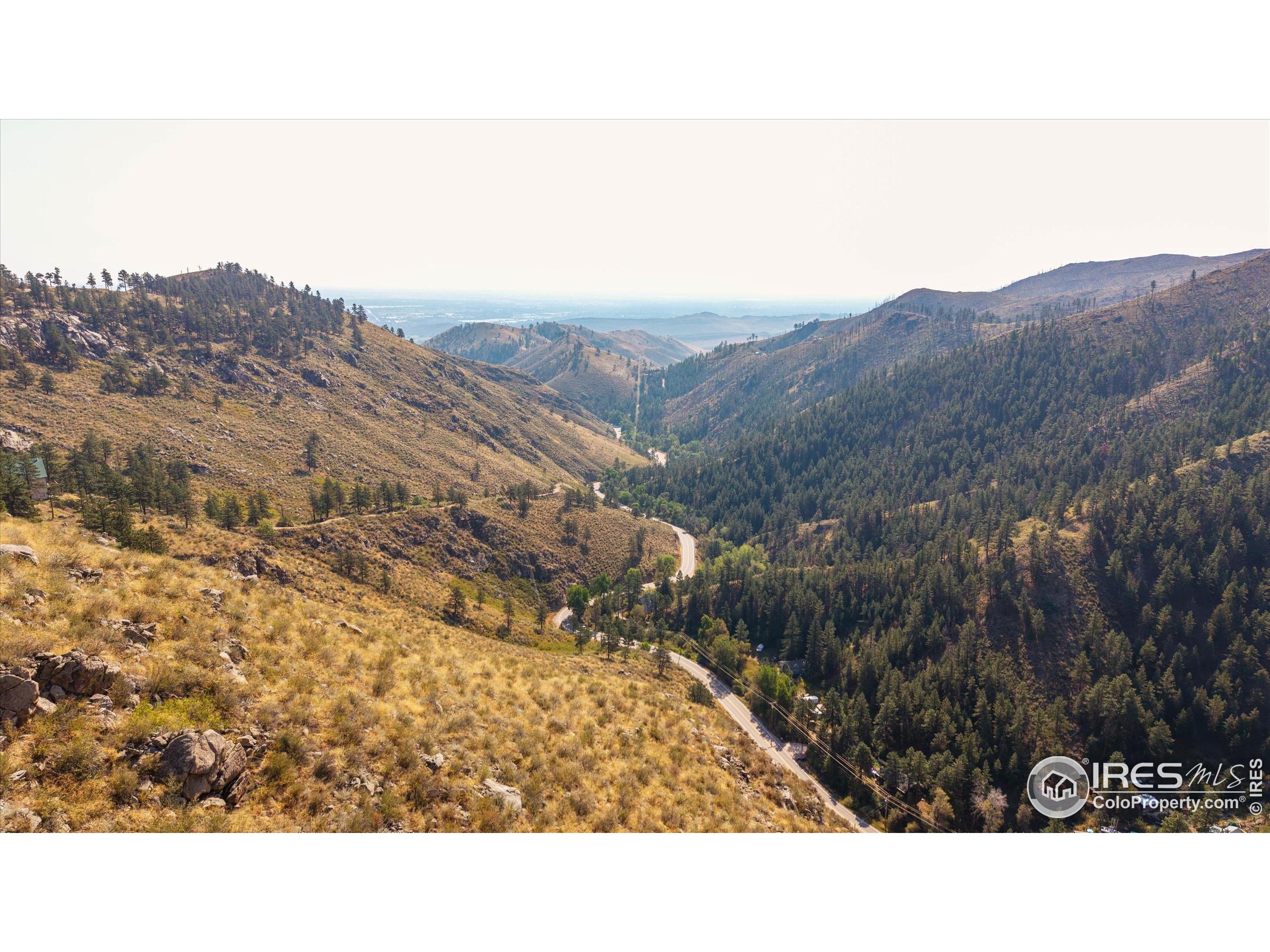 0 Pine Acres Way Bellvue, CO 80512 - Photo 15 of 29 a black and white photo of a house