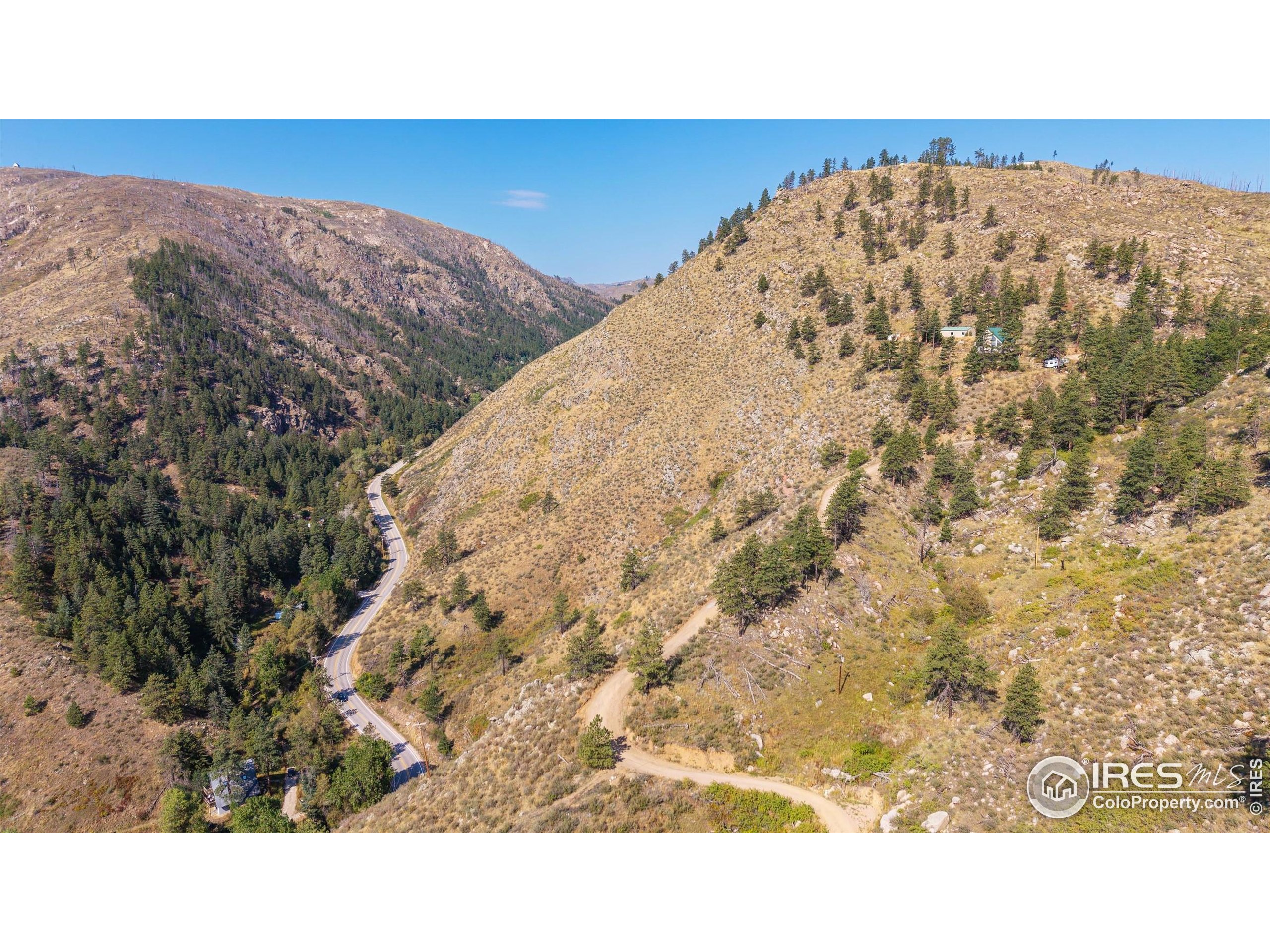 0 Pine Acres Way Bellvue, CO 80512 - Photo 17 of 29 a black and white photo of a house