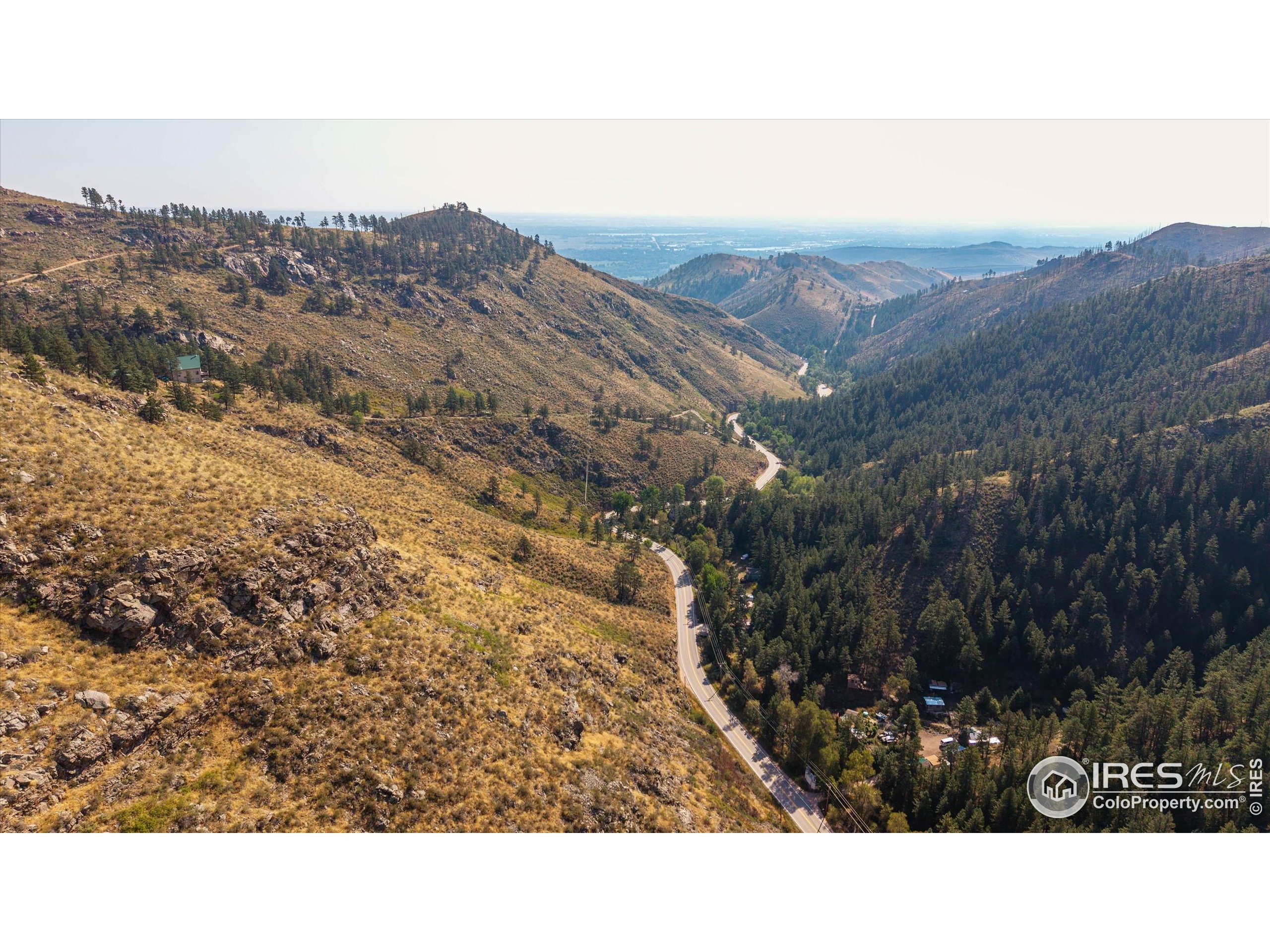 0 Pine Acres Way Bellvue, CO 80512 - Photo 4 of 29 a black and white photo of a mountain