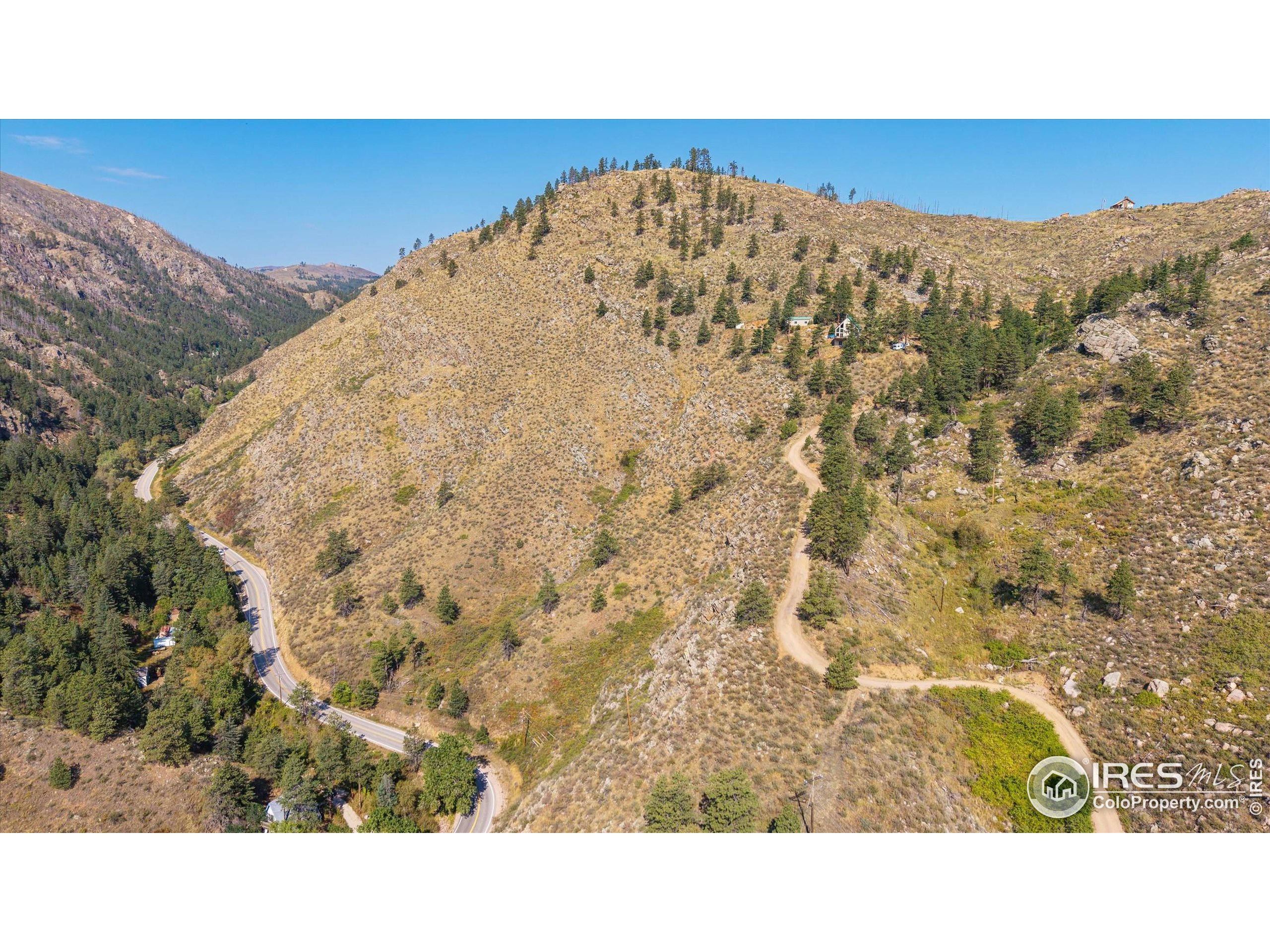 0 Pine Acres Way Bellvue, CO 80512 - Photo 7 of 29 a black and white photo of a house