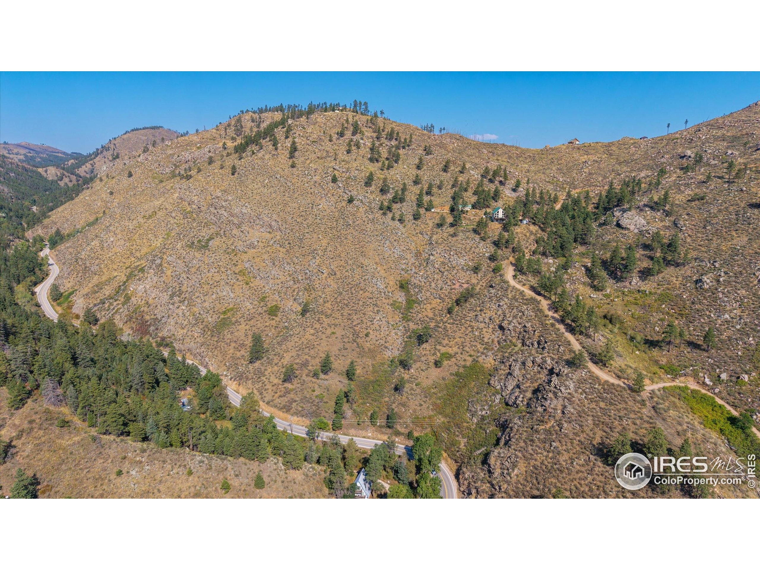 0 Pine Acres Way Bellvue, CO 80512 - Photo 8 of 29 a black and white photo of a mountain