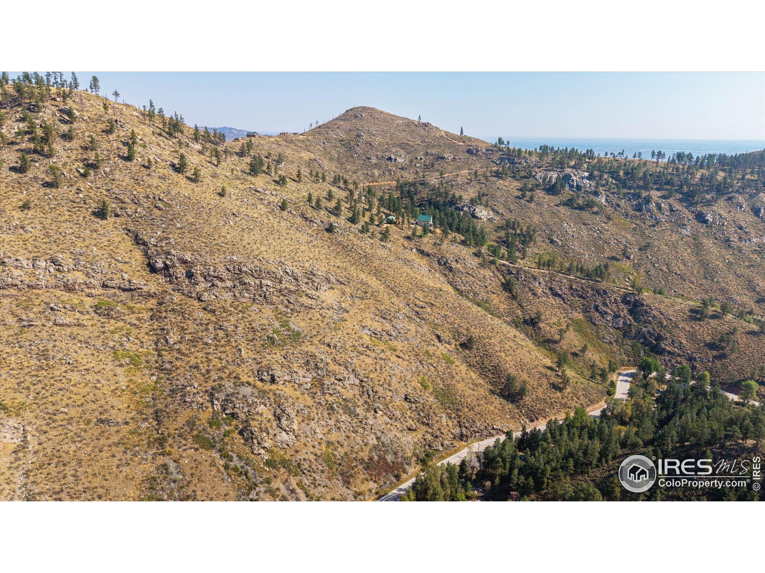 0 Pine Acres Way Bellvue, CO 80512 - Photo 9 of 29 a black and white photo of a house