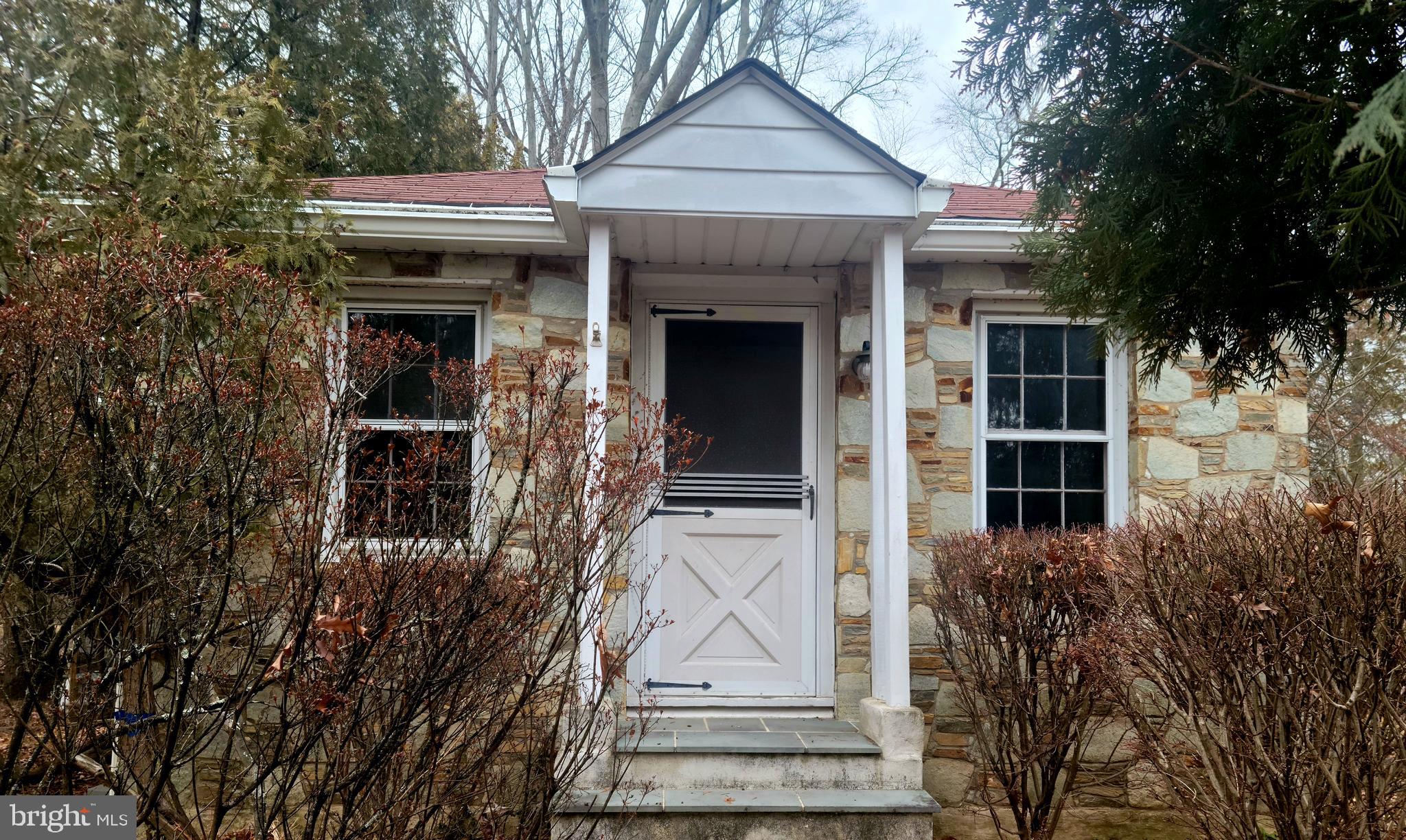 a view of house with outdoor space and porch
