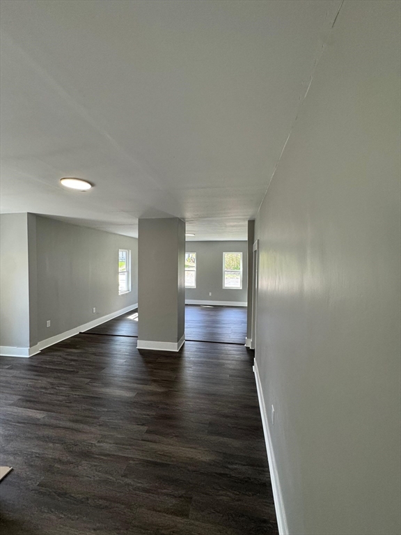 32 Main Street Monson, MA 01057 - Photo 10 of 42 a view of empty room with window and wooden floor