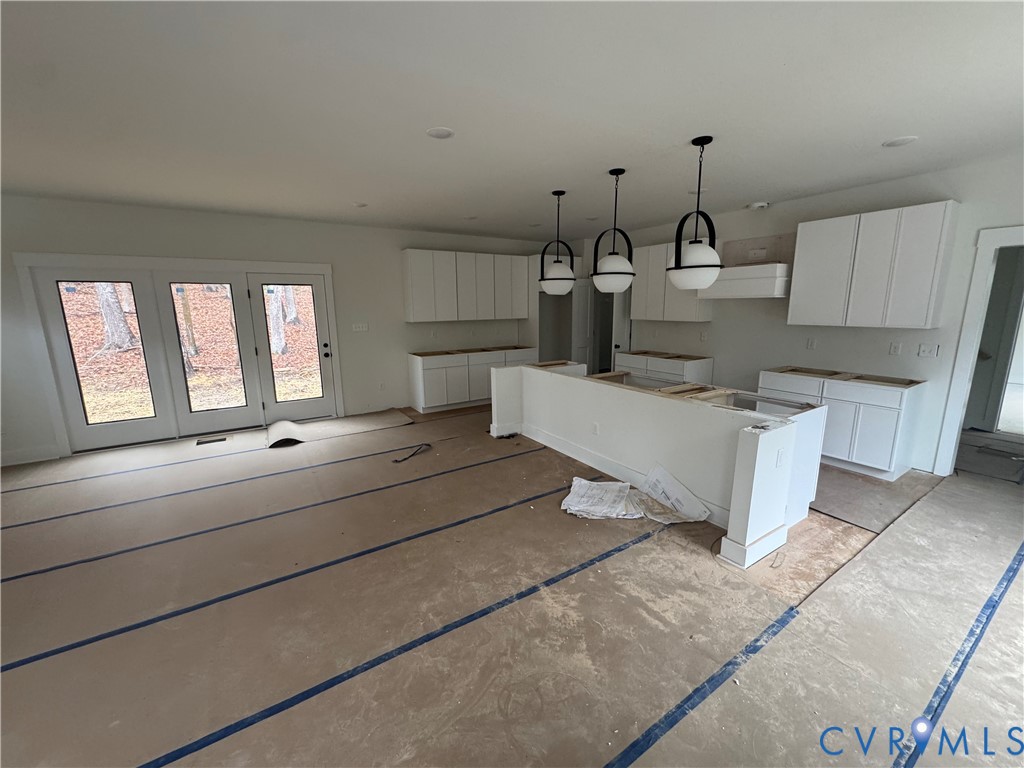 3020 Bradwill Road Richmond, VA 23225 - Photo 3 of 6 a living room with couches and kitchen view