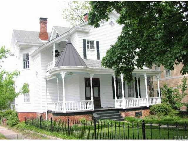 401 East Jones Street Raleigh, NC 27601 - Photo 1 of 1 a front view of a house with a yard
