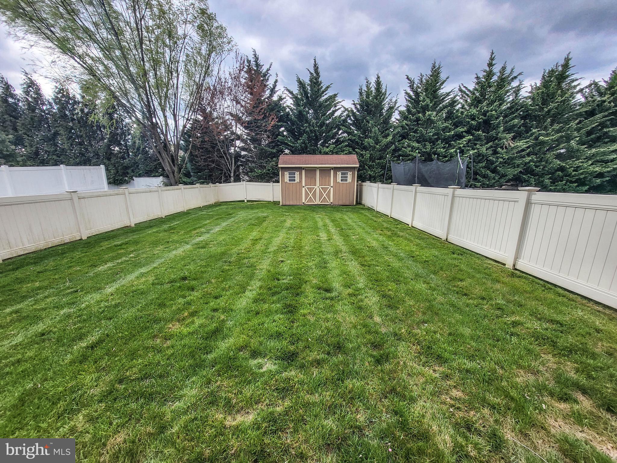 1261 Progress Road Chambersburg, PA 17201 - Photo 18 of 20 Vinyl fenced yard w/shed