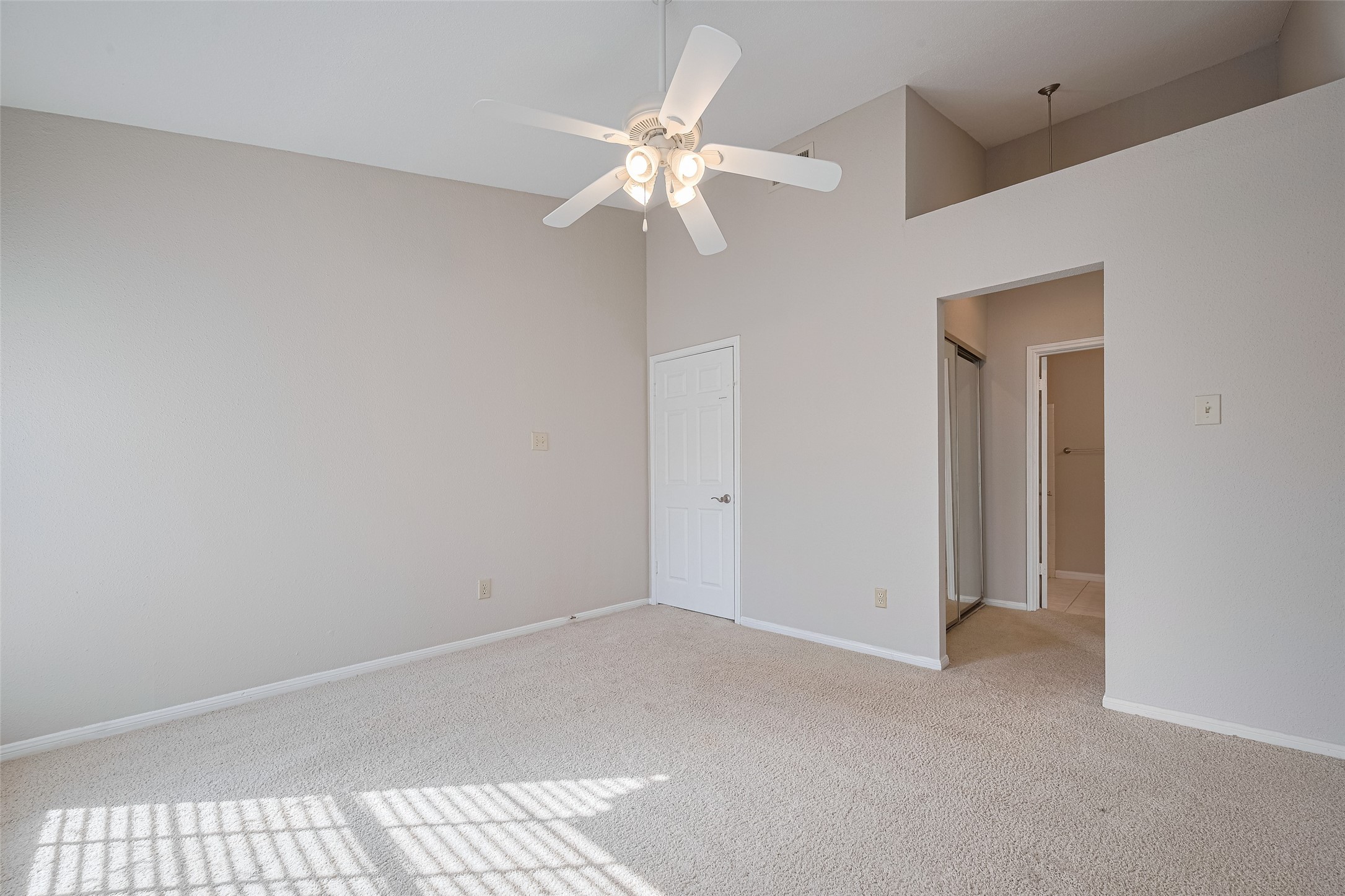 2211 South Kirkwood Road, Unit 19 Houston, TX 77077 - Photo 24 of 39 a view of an empty room with a fan