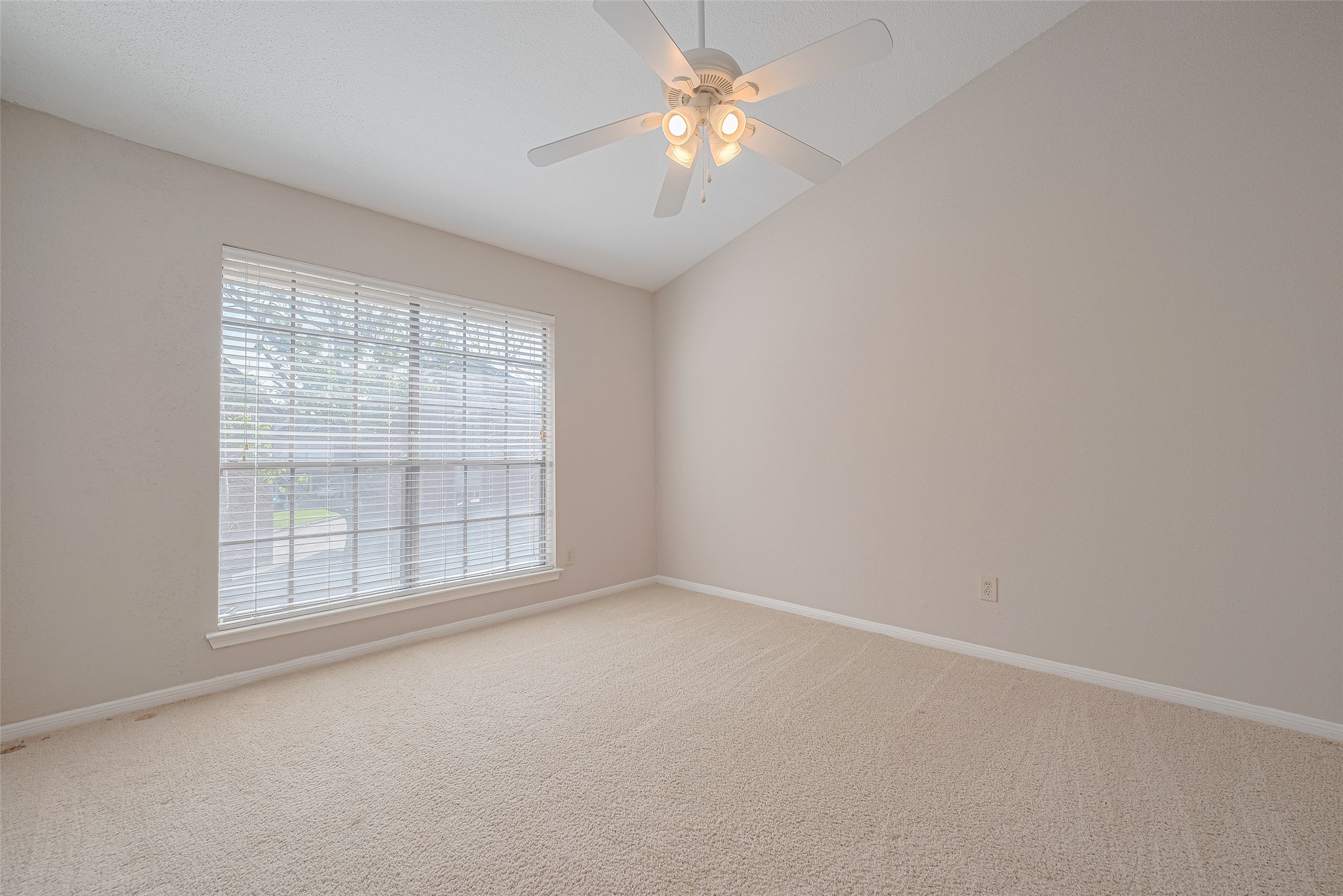 2211 South Kirkwood Road, Unit 19 Houston, TX 77077 - Photo 28 of 39 an empty room with a window