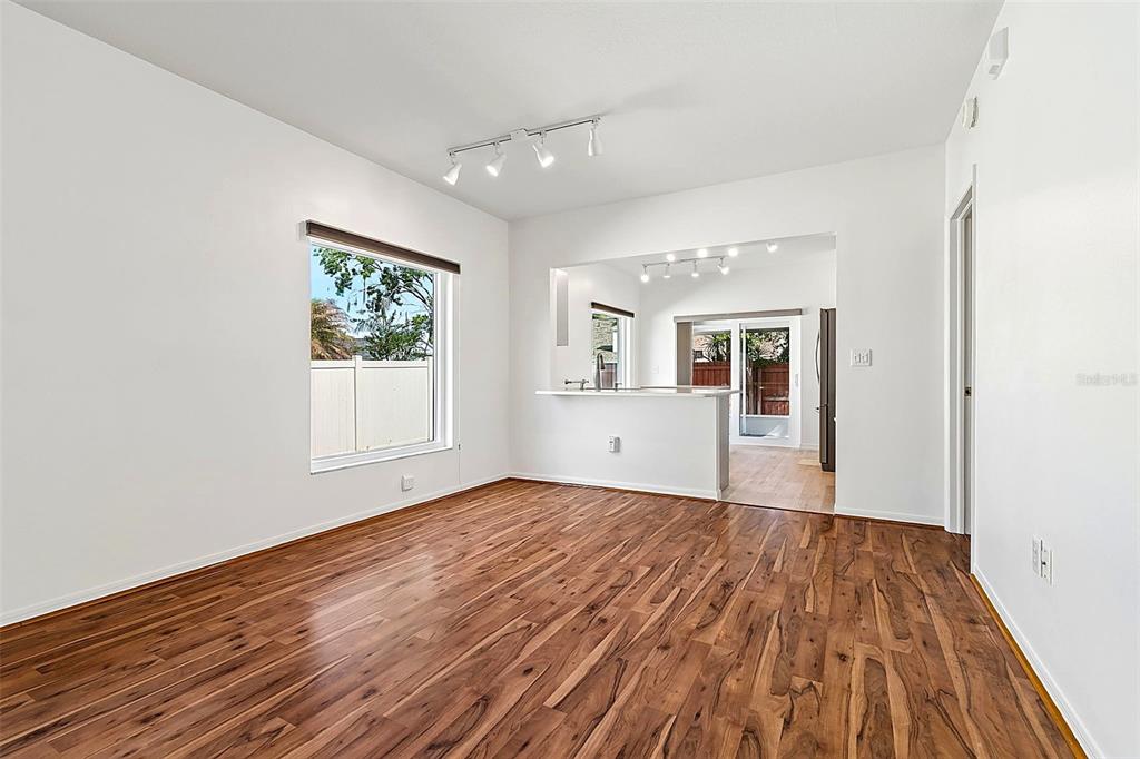 5311 Watson Road Riverview, FL 33578 - Photo 7 of 33 a view of empty room with wooden floor and fan