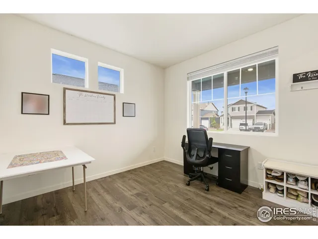 a room with furniture and a window