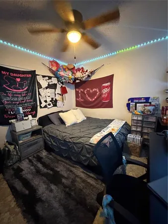 a bed room with a bed and a couch