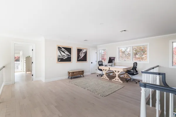 a living room with furniture window and a table