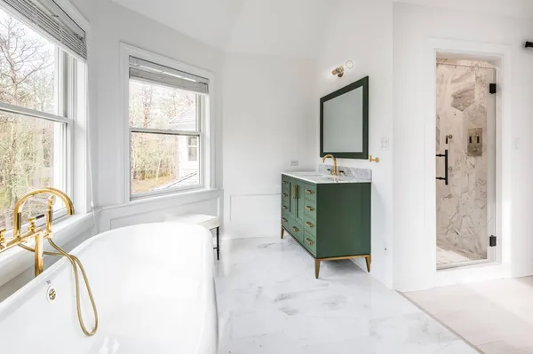a living room with a sink furniture and a window