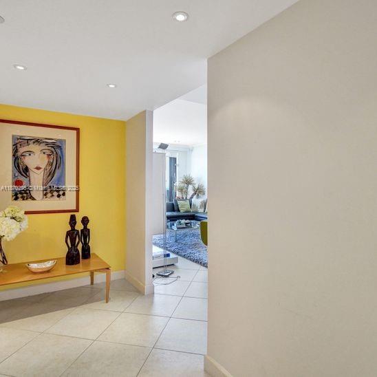 151 Crandon Boulevard, Unit 1130 Key Biscayne, FL 33149 - Photo 9 of 30 a bathroom with a bathtub and a shower