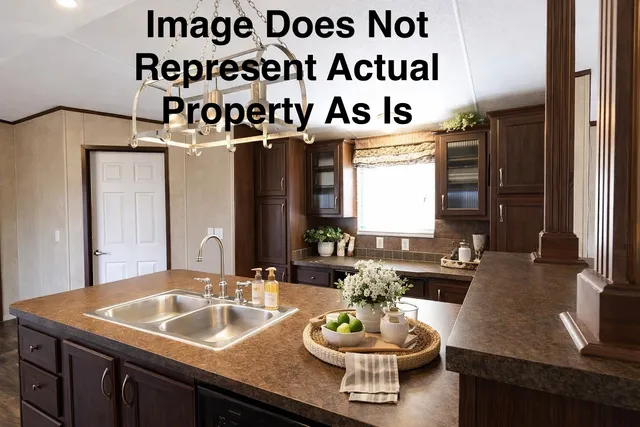 a view of an empty room with wooden floor and closet
