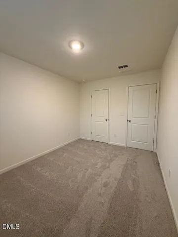 a bathroom with a granite countertop toilet a sink and bathtub