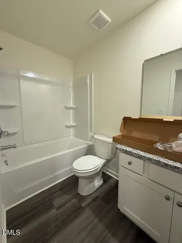 an empty room with a empty space and a window