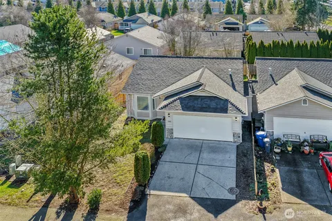 a view of a backyard of the house