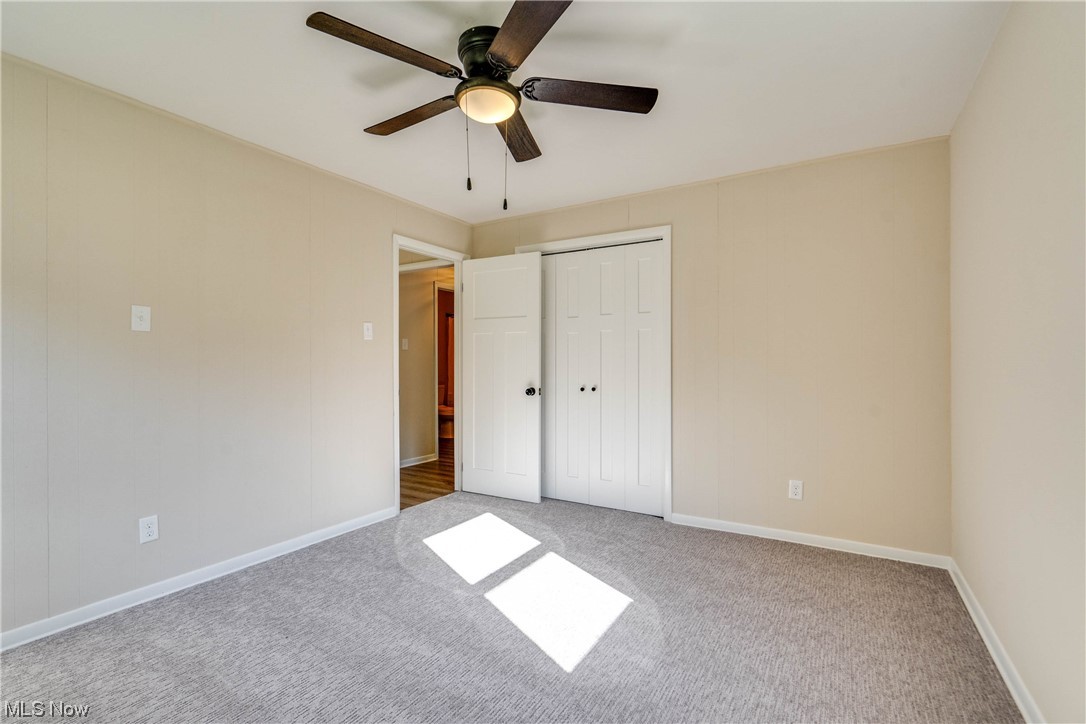 1173 Dussel Road Kent, OH 44240 - Photo 15 of 16 Carpeted bedroom with ceiling fan