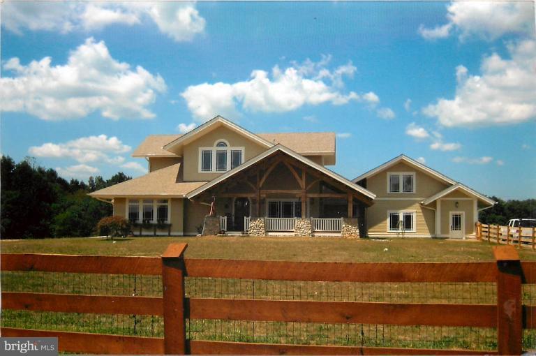 18340 Cattail Road Poolesville, MD 20837 - Photo 1 of 30 a front view of a house with a yard