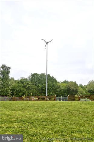 18340 Cattail Road Poolesville, MD 20837 - Photo 2 of 30 a view of a green field with grass